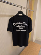 Tricou negru cu logo și buzunar