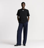 Tricou negru cu etichetă, croială relaxată